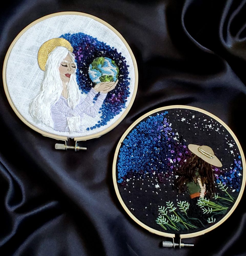 Embroidered Heavenly Mother holding earth and embroidered woman looking at stars.