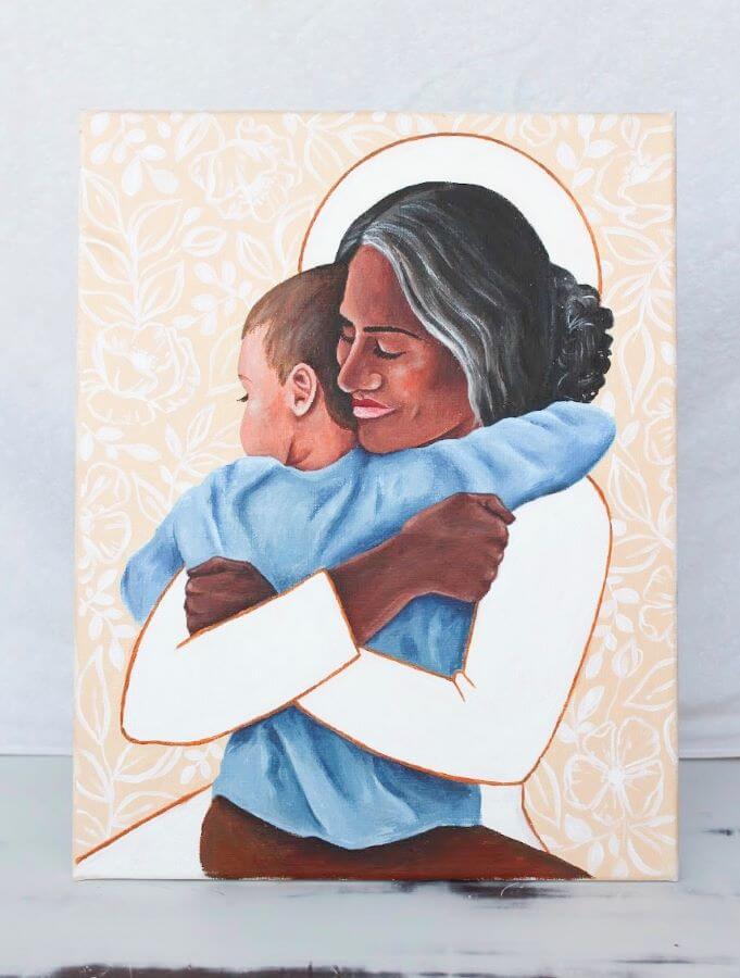 Black woman with white halo hugging young Black boy